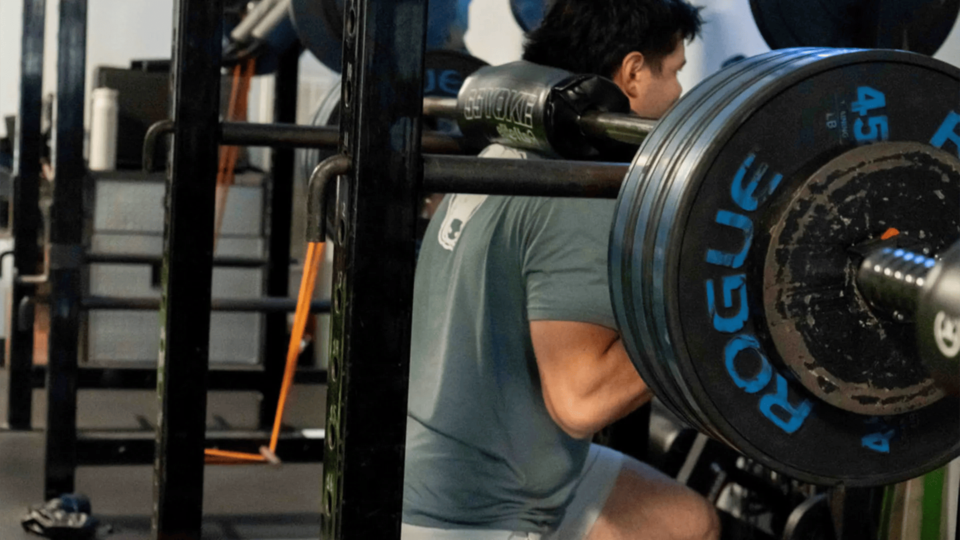 man lifting heavy weight at Belding Performance